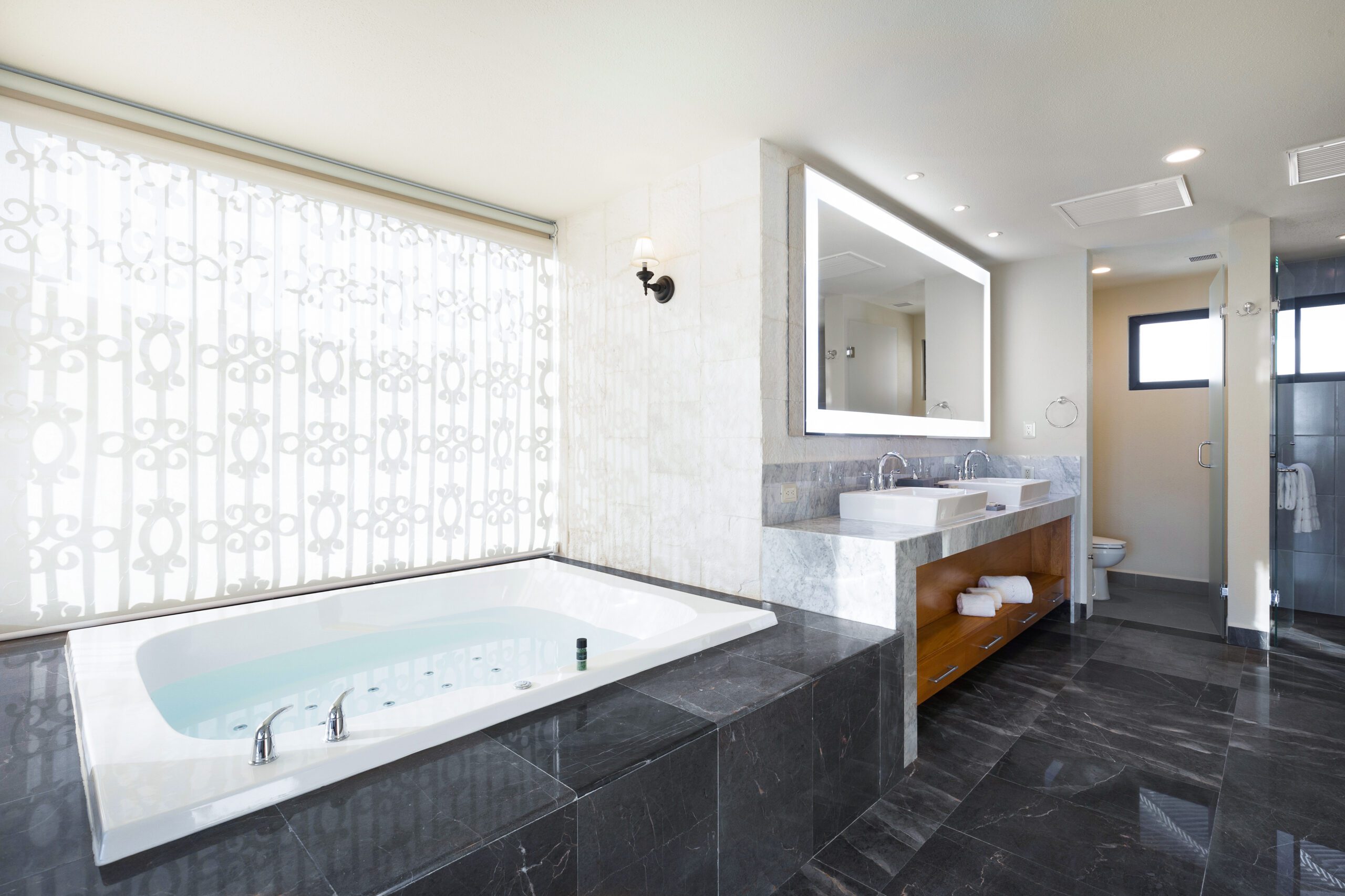 Four Bedroom Ocean Front Lockoff at Villa La Valencia - luxury bathroom with hot tub